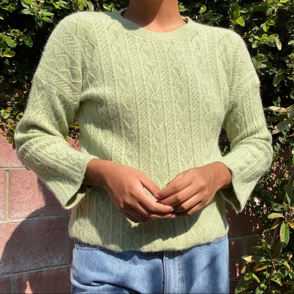 green knit sweater